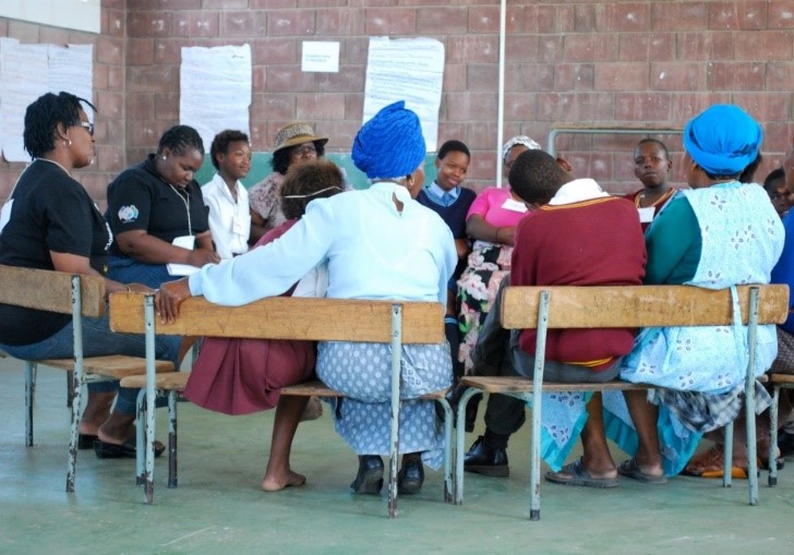 Photo of group session in treatment village (Source: Sinovuyo Teen Project)
